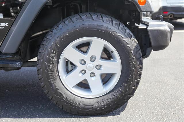 used 2018 Jeep Wrangler JK Unlimited car, priced at $22,388