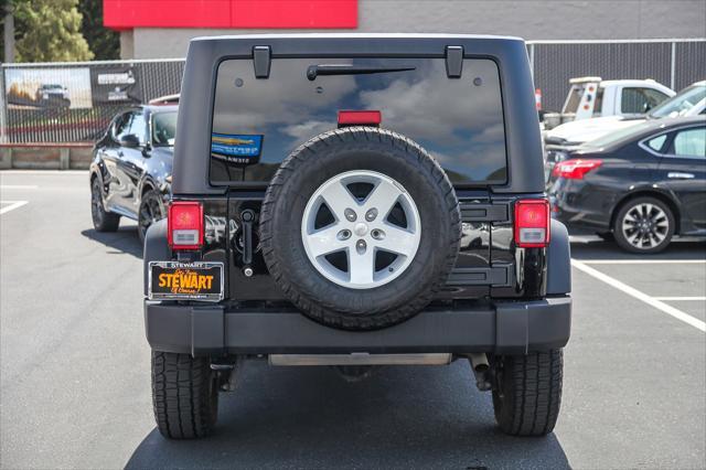 used 2018 Jeep Wrangler JK Unlimited car, priced at $22,388