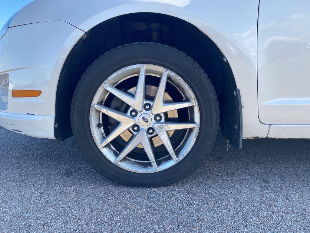 used 2012 Ford Fusion car, priced at $2,392