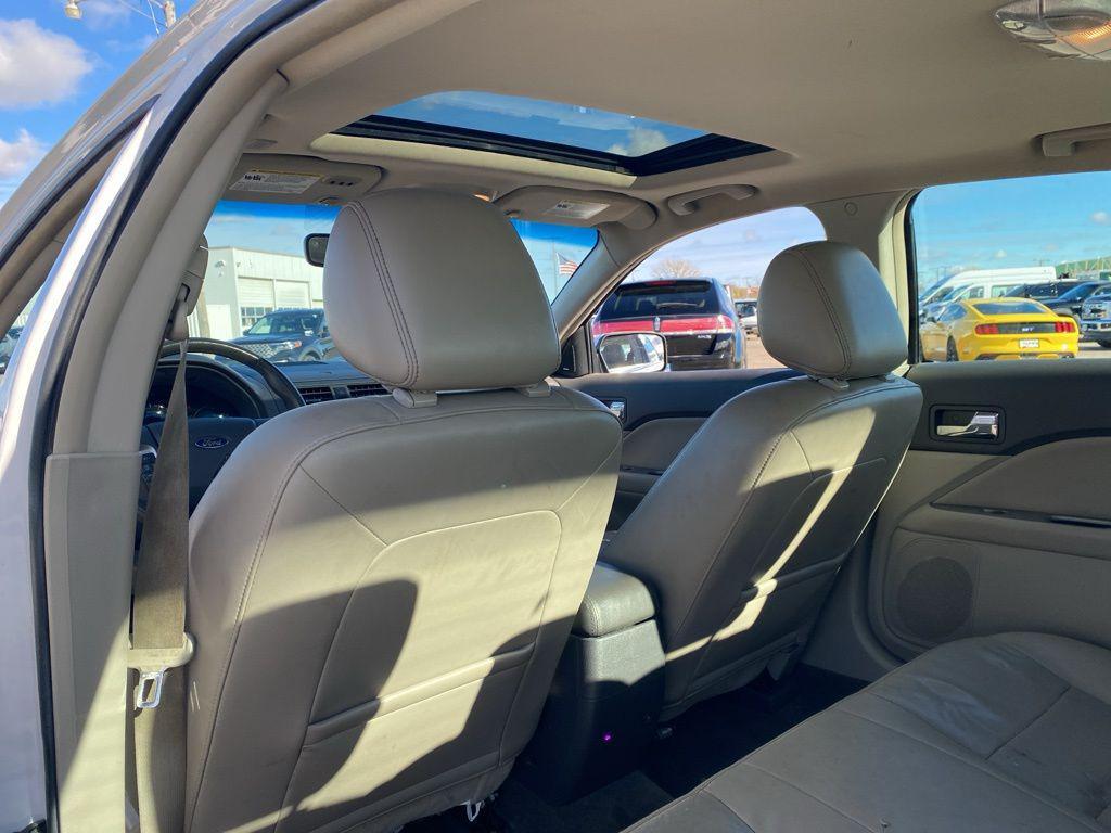 used 2012 Ford Fusion car, priced at $2,392