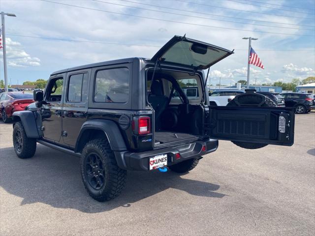 used 2023 Jeep Wrangler 4xe car, priced at $33,905