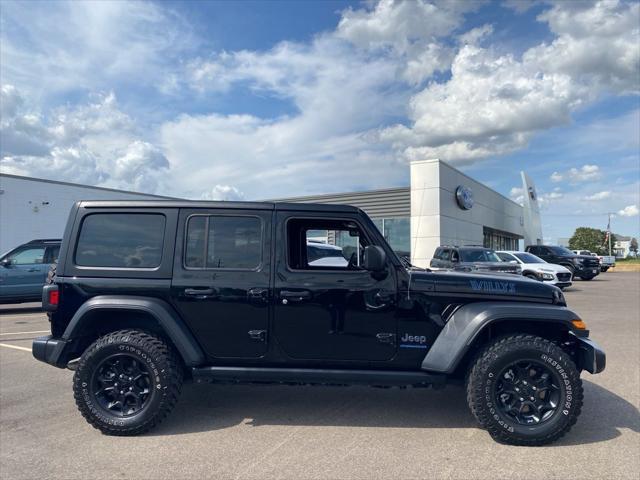 used 2023 Jeep Wrangler 4xe car, priced at $33,905