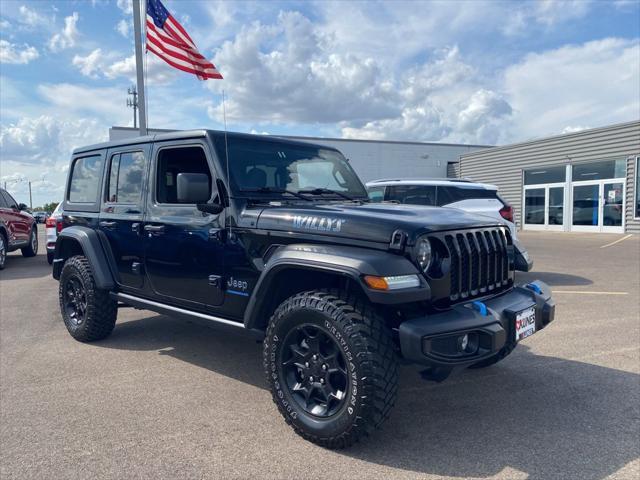 used 2023 Jeep Wrangler 4xe car, priced at $33,905