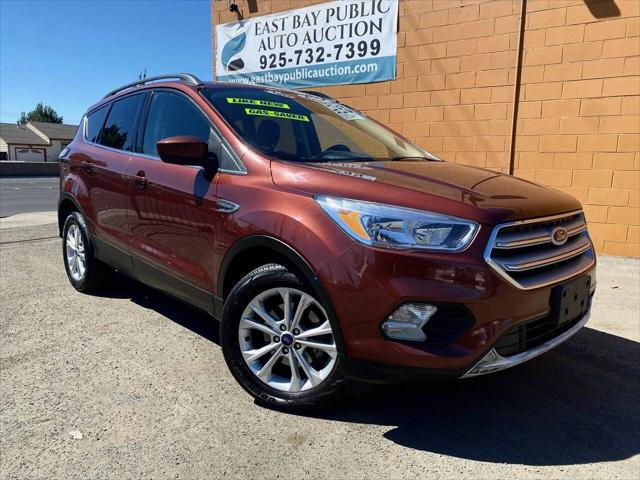 used 2018 Ford Escape car, priced at $12,999