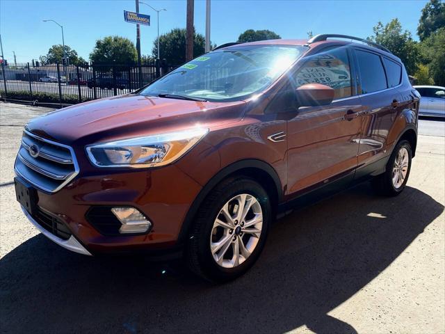 used 2018 Ford Escape car, priced at $12,999