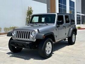 used 2015 Jeep Wrangler Unlimited car, priced at $18,698