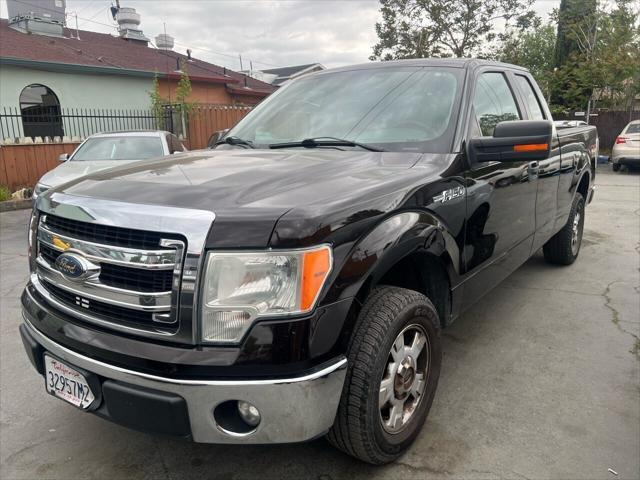 used 2014 Ford F-150 car, priced at $7,390