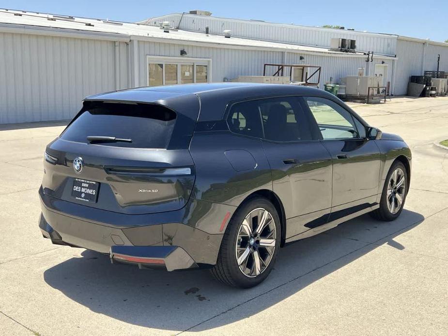 new 2024 BMW iX car, priced at $99,045