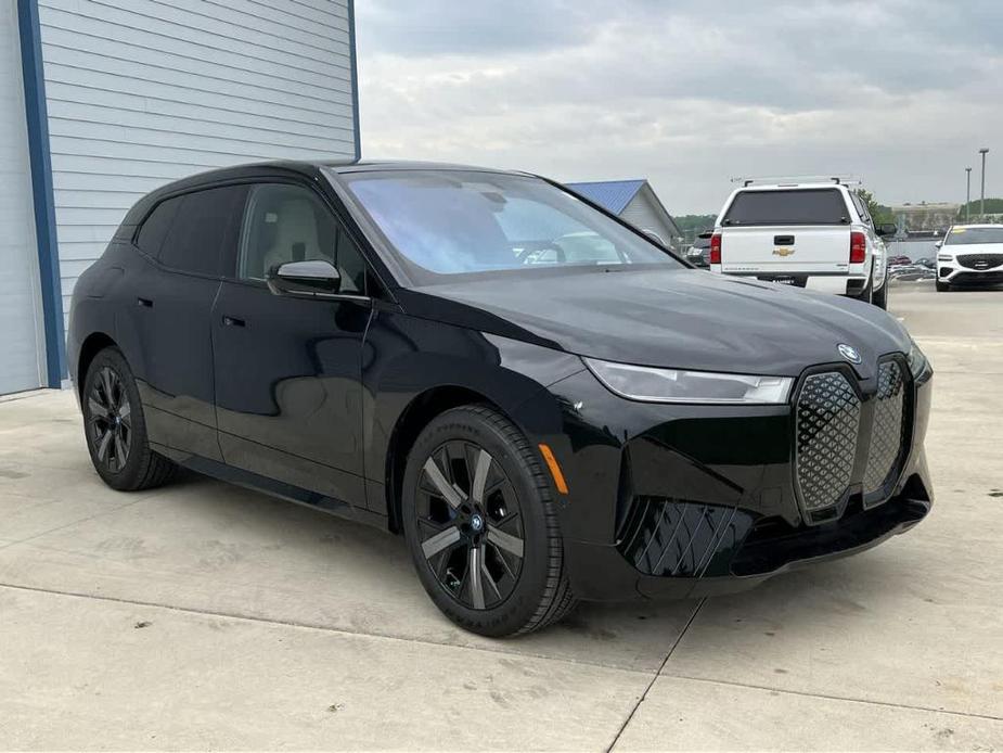 new 2024 BMW iX car, priced at $95,095