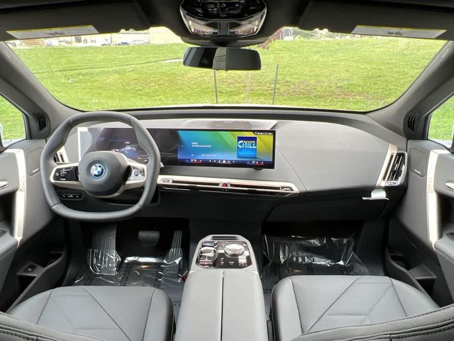 new 2024 BMW iX car, priced at $98,045