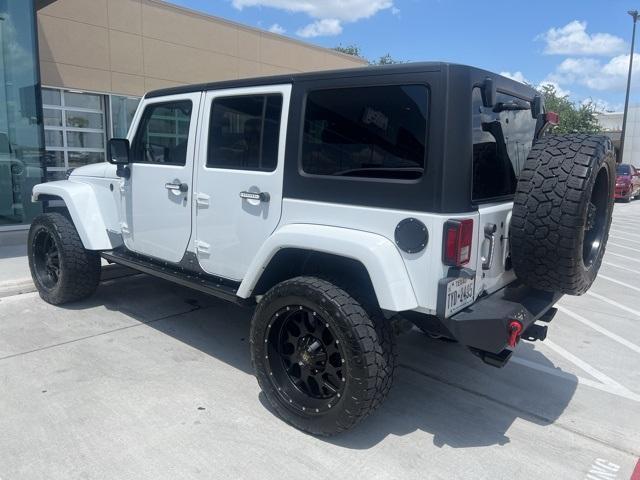 used 2014 Jeep Wrangler Unlimited car, priced at $20,991
