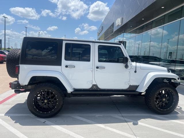 used 2014 Jeep Wrangler Unlimited car, priced at $20,991