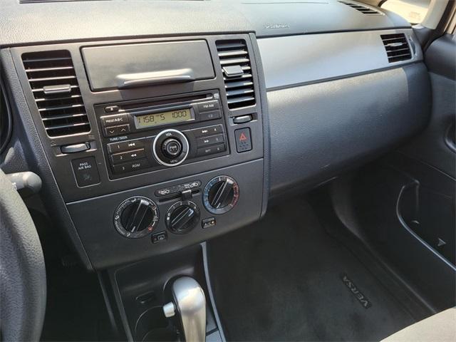 used 2009 Nissan Versa car, priced at $7,000