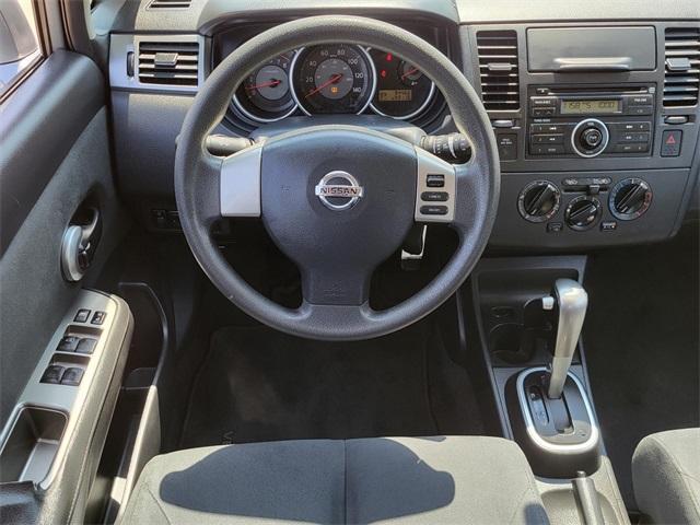 used 2009 Nissan Versa car, priced at $7,000