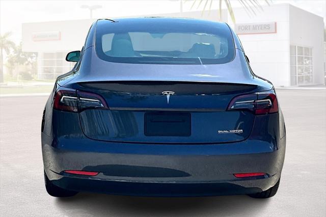 used 2023 Tesla Model 3 car, priced at $33,875