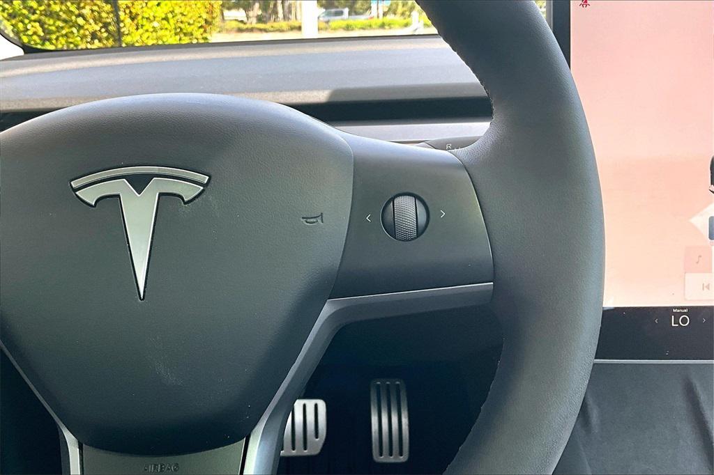 used 2023 Tesla Model 3 car, priced at $29,999
