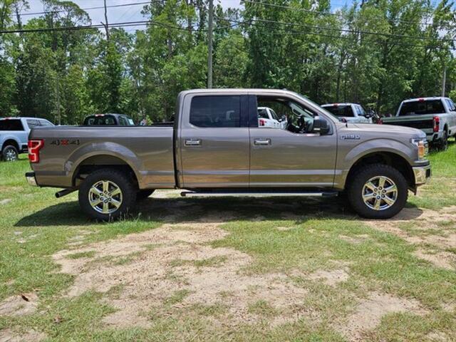 used 2018 Ford F-150 car, priced at $29,559