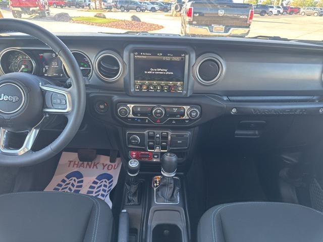 used 2023 Jeep Wrangler 4xe car, priced at $36,506