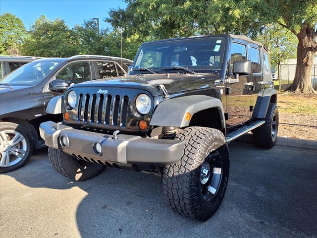 used 2011 Jeep Wrangler Unlimited car, priced at $15,900