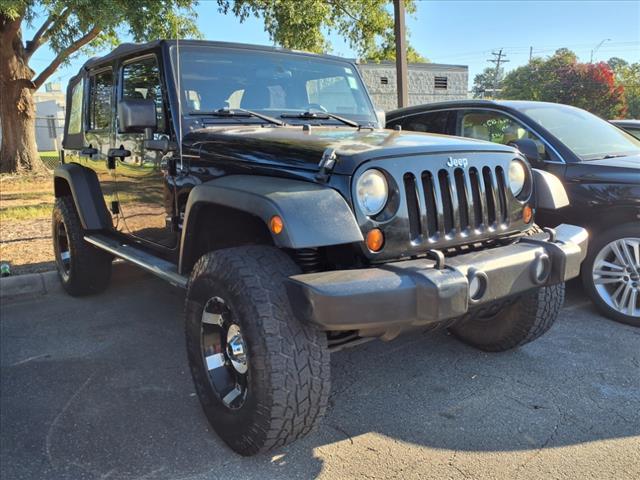 used 2011 Jeep Wrangler Unlimited car, priced at $15,900