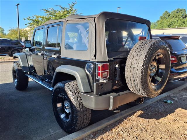 used 2011 Jeep Wrangler Unlimited car, priced at $15,900