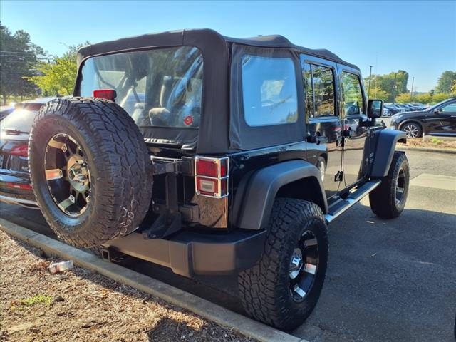 used 2011 Jeep Wrangler Unlimited car, priced at $15,900