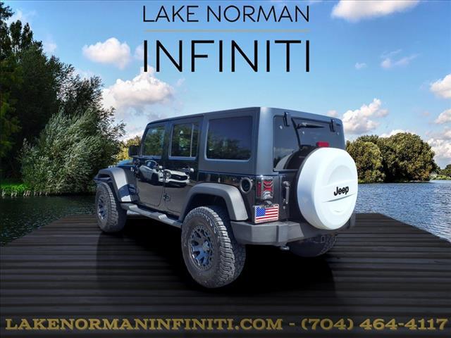 used 2014 Jeep Wrangler Unlimited car, priced at $16,900