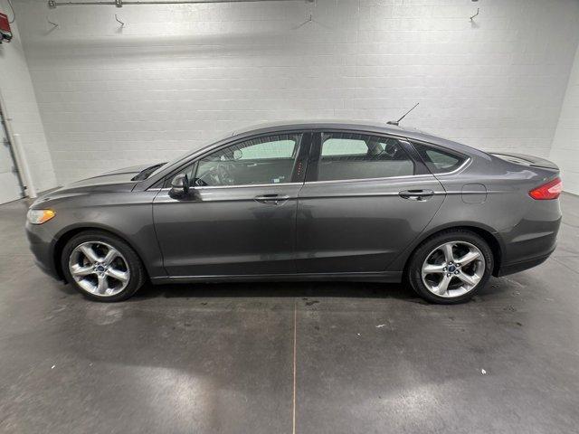 used 2015 Ford Fusion car, priced at $7,000