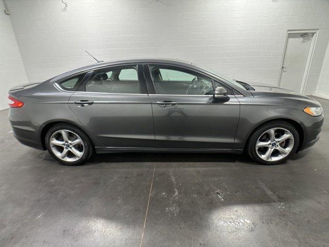 used 2015 Ford Fusion car, priced at $7,000