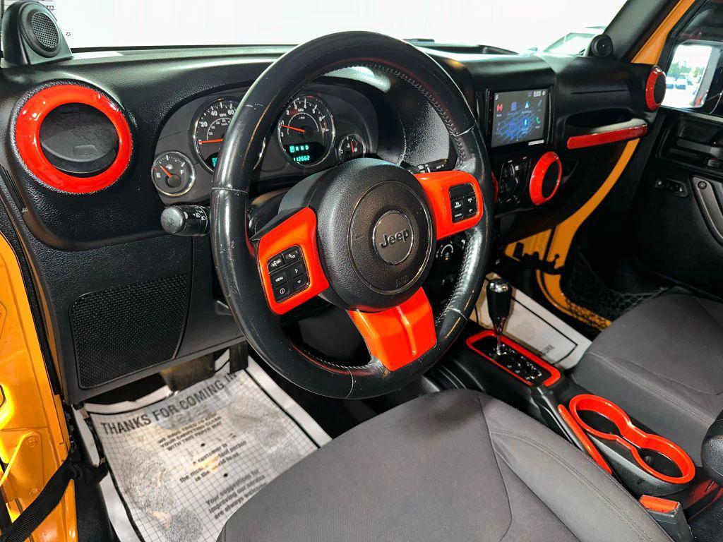 used 2013 Jeep Wrangler Unlimited car, priced at $14,472