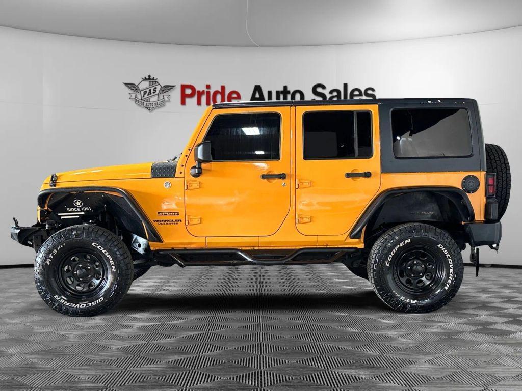 used 2013 Jeep Wrangler Unlimited car, priced at $14,472