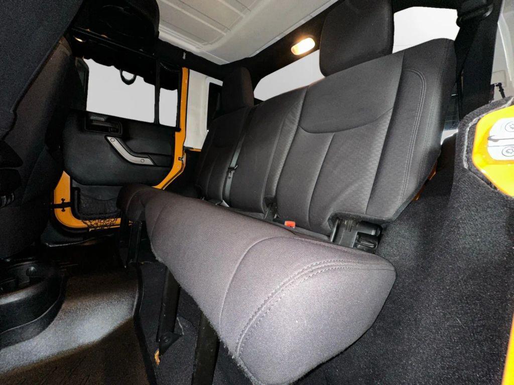 used 2013 Jeep Wrangler Unlimited car, priced at $14,472