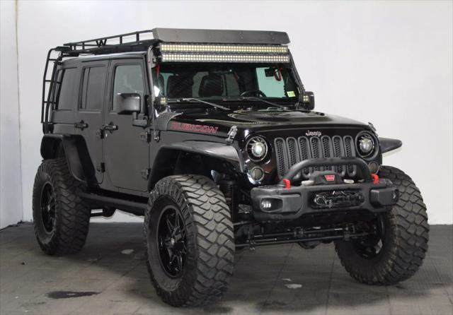 used 2016 Jeep Wrangler Unlimited car, priced at $25,554