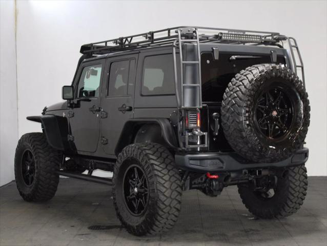 used 2016 Jeep Wrangler Unlimited car, priced at $25,554