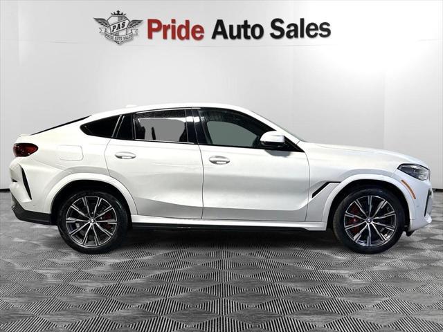 used 2023 BMW X6 car, priced at $61,496