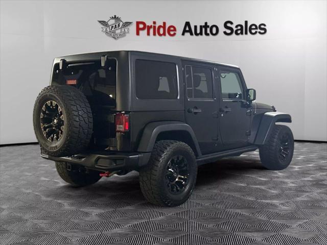 used 2017 Jeep Wrangler Unlimited car, priced at $22,234