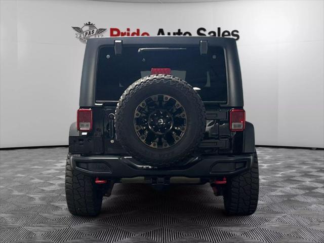 used 2017 Jeep Wrangler Unlimited car, priced at $22,234