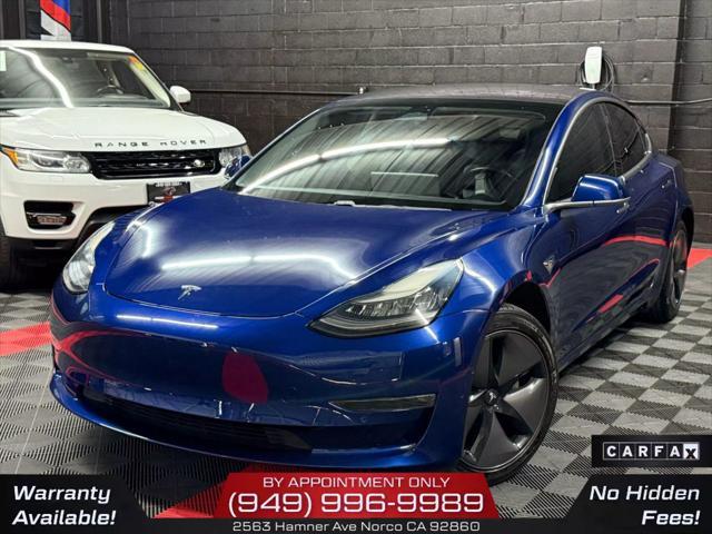 used 2018 Tesla Model 3 car, priced at $14,950