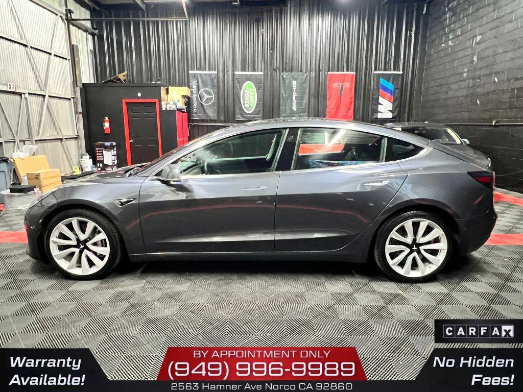 used 2018 Tesla Model 3 car, priced at $15,300