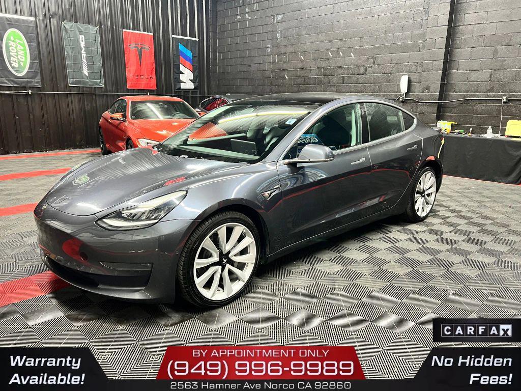 used 2018 Tesla Model 3 car, priced at $15,300
