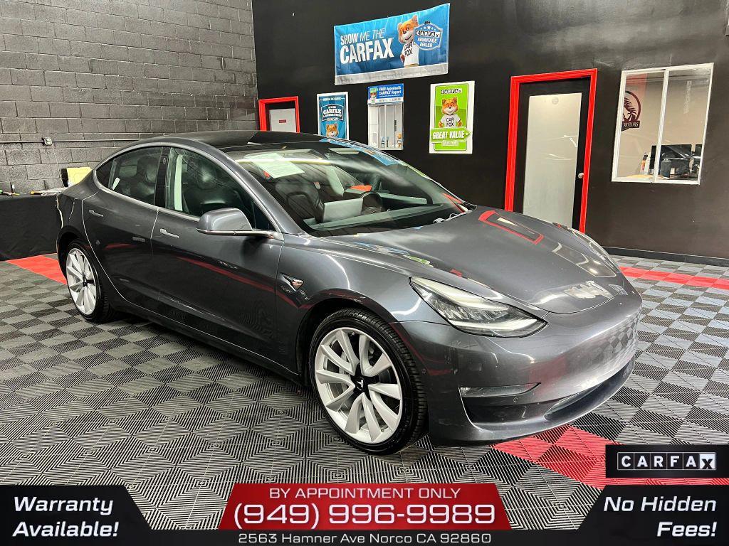 used 2018 Tesla Model 3 car, priced at $15,300