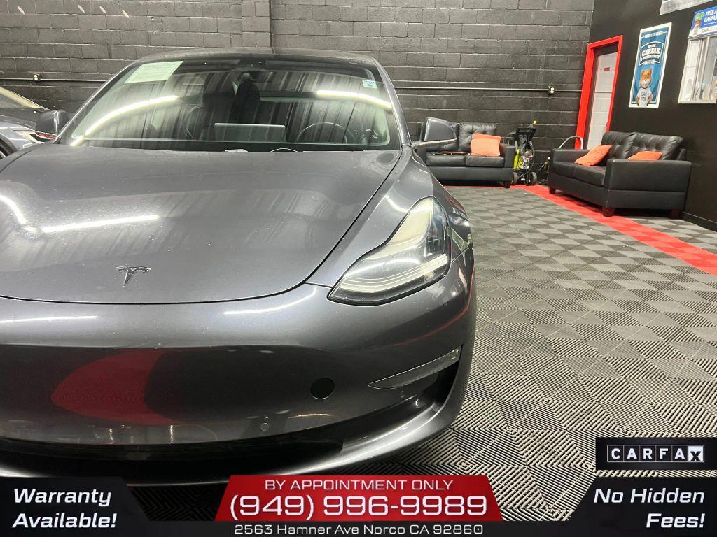 used 2018 Tesla Model 3 car, priced at $15,300