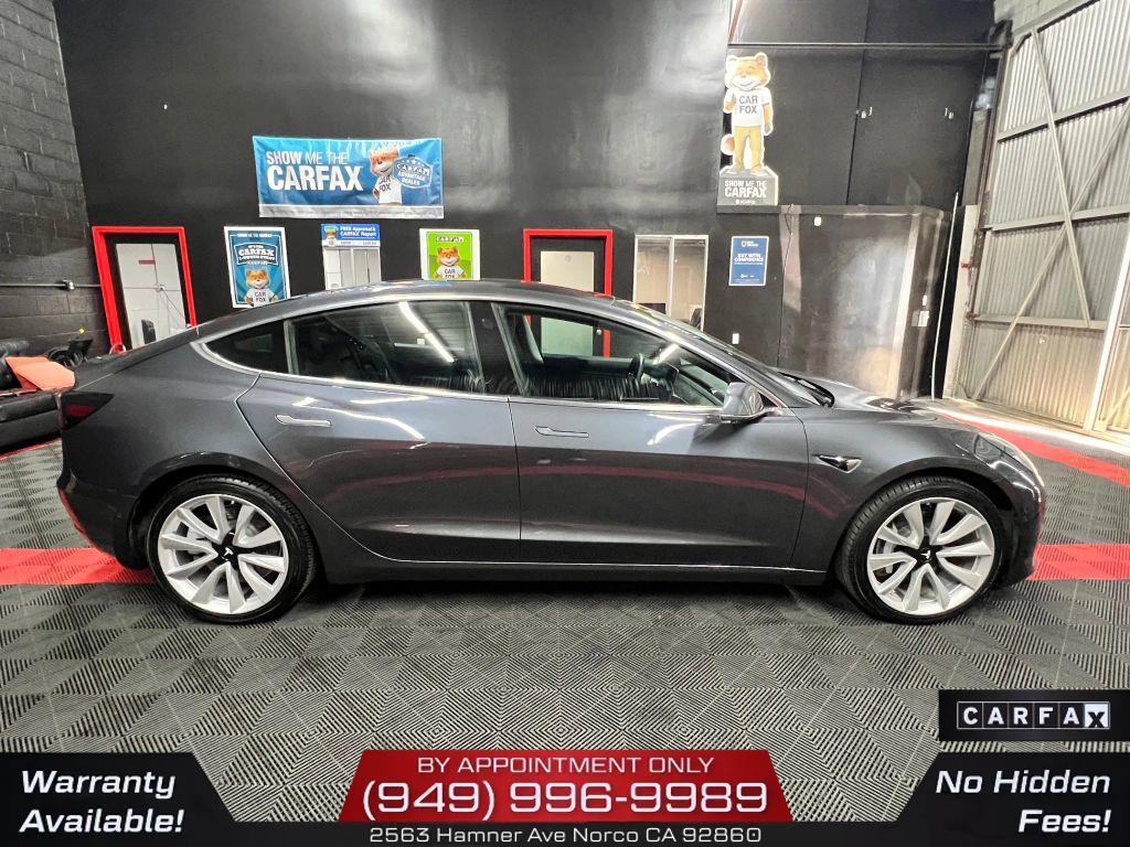 used 2018 Tesla Model 3 car, priced at $15,300