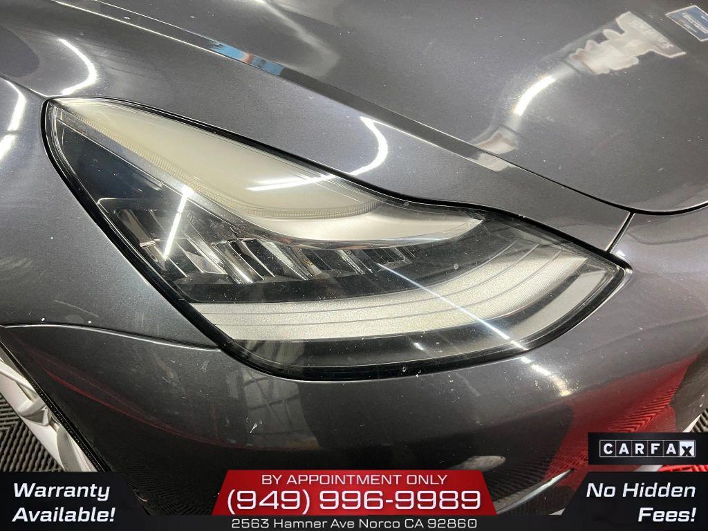 used 2018 Tesla Model 3 car, priced at $15,300