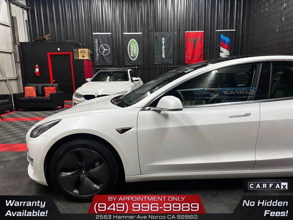 used 2019 Tesla Model 3 car, priced at $13,950