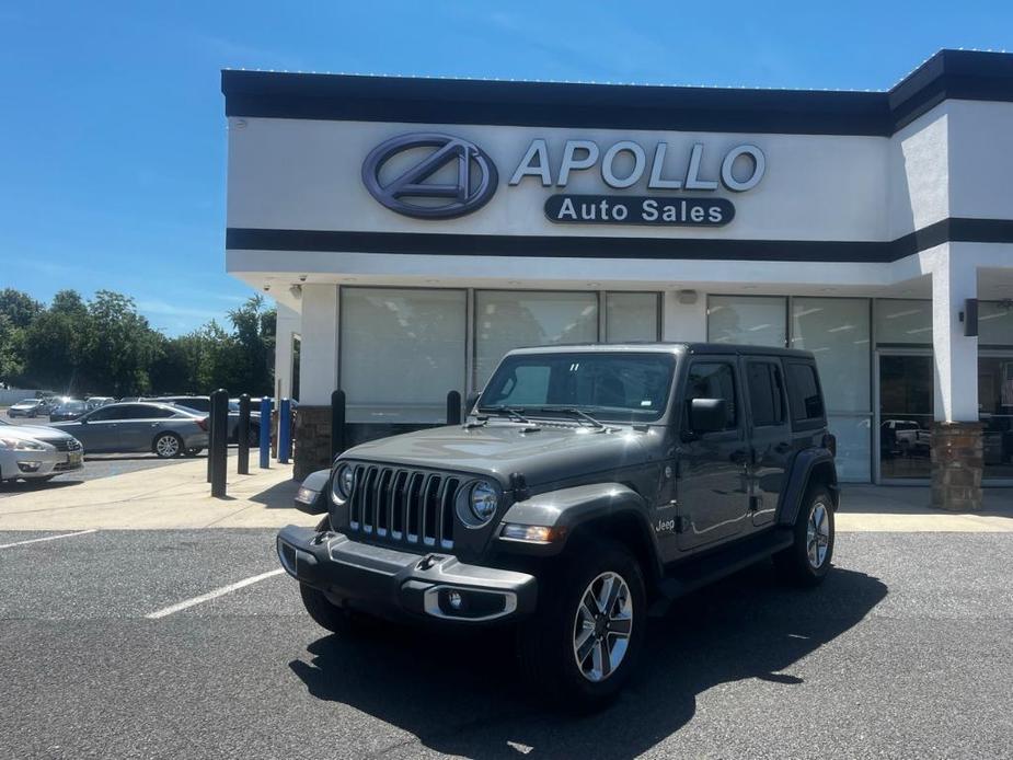 used 2022 Jeep Wrangler Unlimited car, priced at $38,656