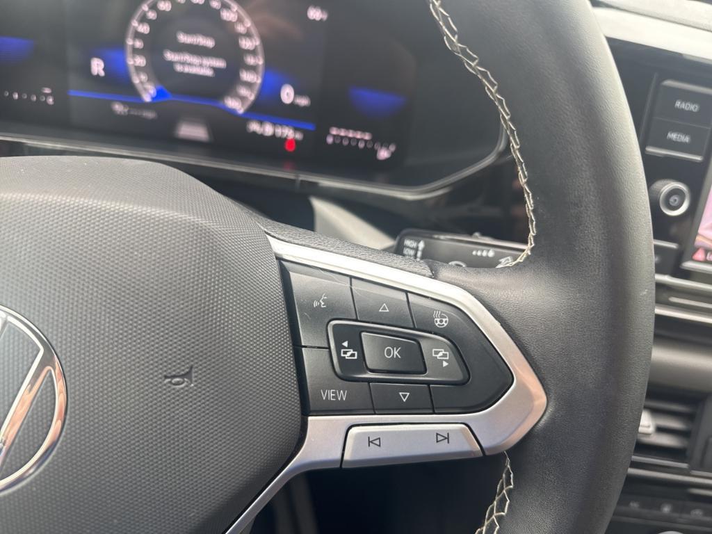 used 2024 Volkswagen Taos car, priced at $22,447