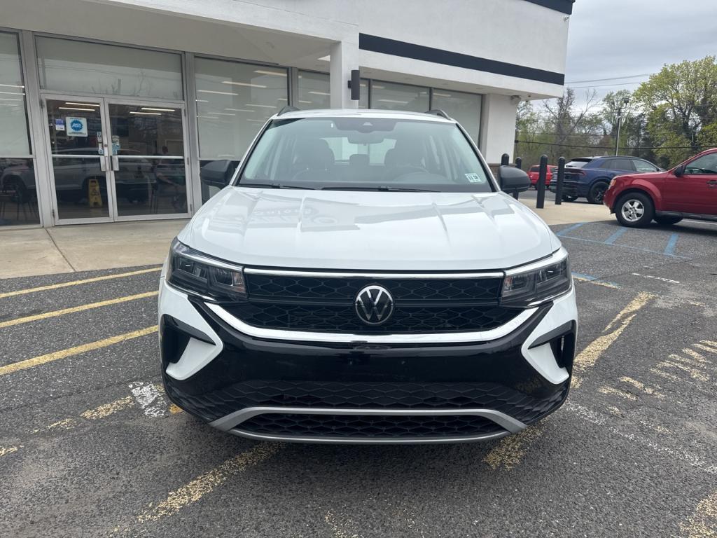 used 2024 Volkswagen Taos car, priced at $22,447