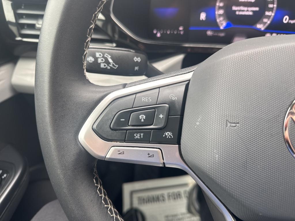 used 2024 Volkswagen Taos car, priced at $22,447