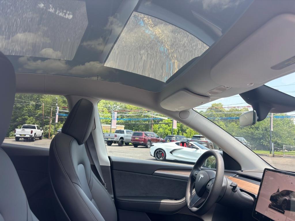 used 2025 Tesla Model Y car, priced at $38,777